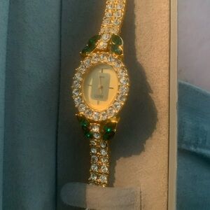Avanti Womens Watch diamond and emarald gold tone